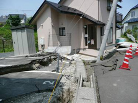 damaged house in Takamori