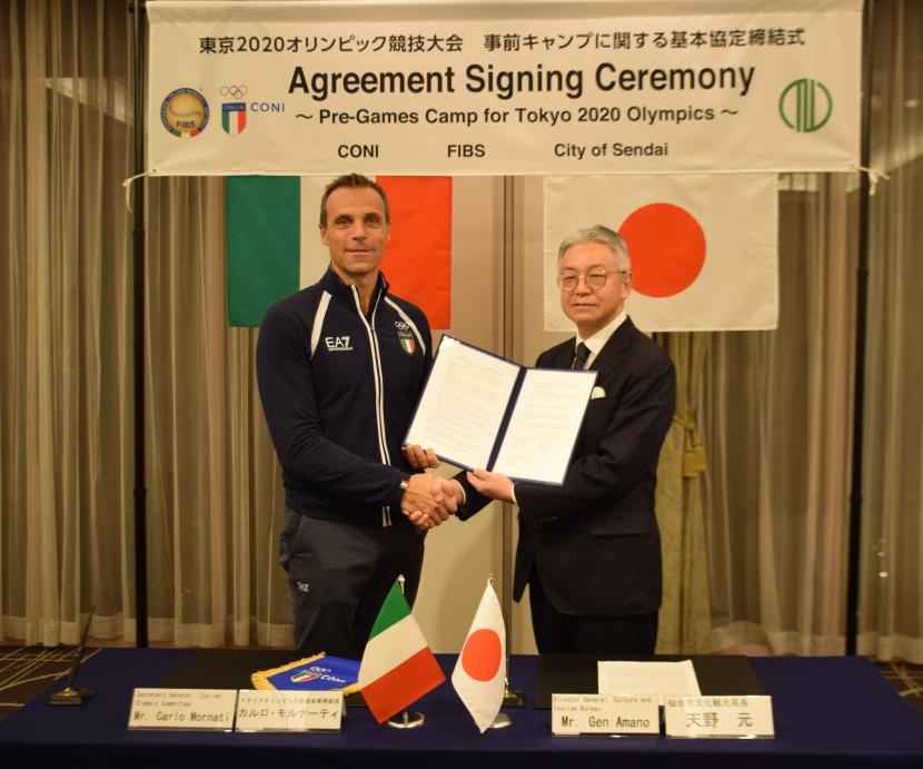 画像：仙台市文化観光局長とイタリアオリンピック委員会事務総長による署名の様子